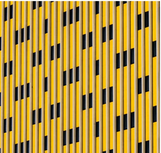 Side of a yellow office building graphic